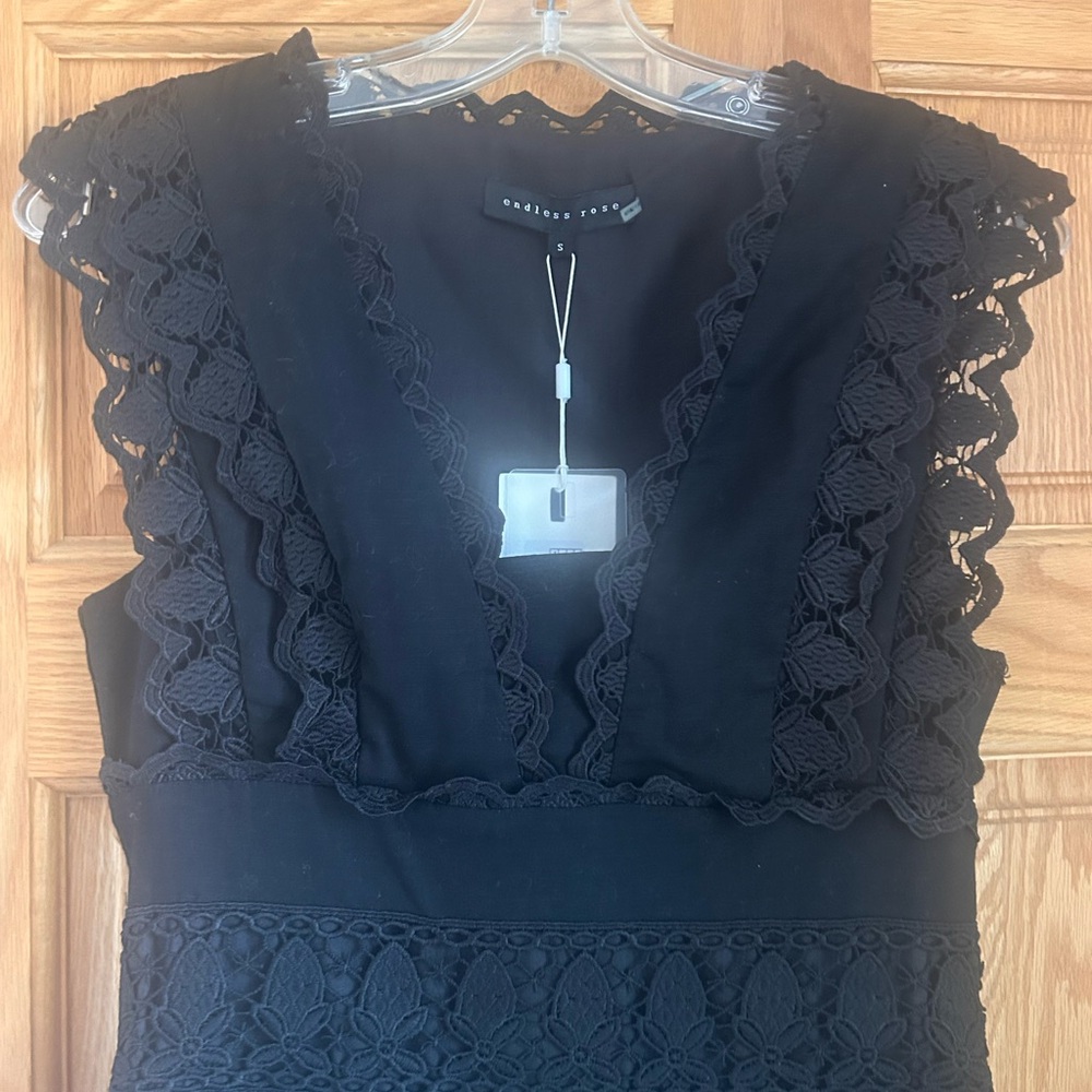 Endless Rose Black Mini Dress with Lace Detail!